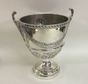 An attractive Edwardian silver sugar bowl with swa