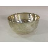 A heavy Edwardian silver sugar bowl of plain form.