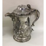 A good quality Georgian chased silver lidded tanka