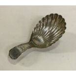 A Georgian silver caddy spoon with bright cut deco