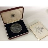 A cased silver Royal Mint medallion to commemorate