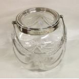 A silver mounted cut glass biscuit barrel of circu