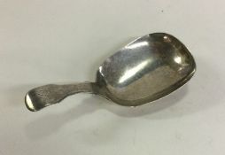 A good Georgian silver fiddle pattern caddy spoon.