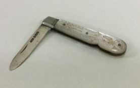 A silver and MOP travelling fruit knife. Birmingha