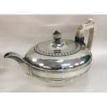 A good heavy circular Georgian silver teapot. Lond