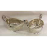 A good pair of Georgian silver sauce boats with fl