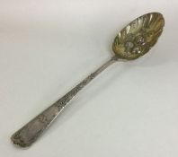 A heavy OE pattern silver berry spoon. London 1895