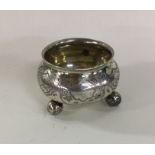 A Russian silver salt engraved with flowers to bal