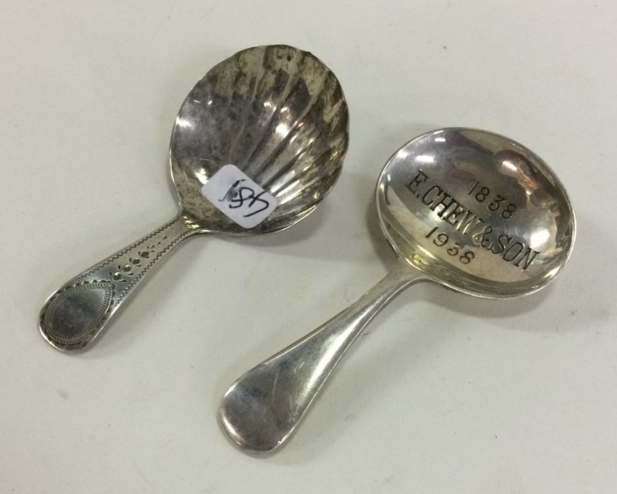 A Georgian silver caddy spoon with bright cut deco