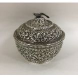 A good quality chased Indian silver bowl and cover