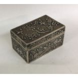 A rectangular Chinese silver hinged top box of typ