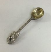 A good cast silver salt spoon with acorn finial. B