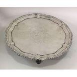 A George III circular silver salver with crested f