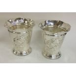 A good pair of silver spill vases decorated with t