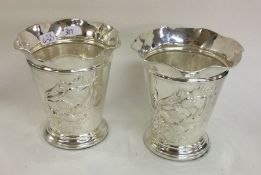 A good pair of silver spill vases decorated with t