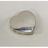 A heart shaped silver hinged top pill box. London.