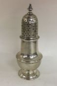 A good heavy Georgian silver caster of typical for