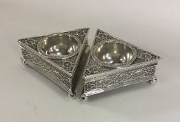 A pair of Victorian cast silver salts of triangula