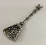 A heavy Dutch silver preserve spoon mounted with a