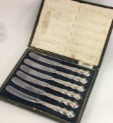 A cased set of six silver handled tea knives. Birm