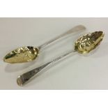 A good pair of George III silver berry spoons with