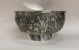 A good circular Chinese silver bowl of typical des