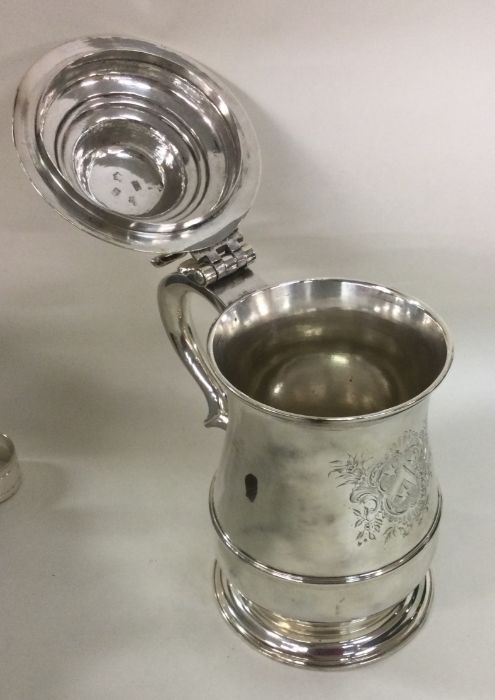 A good Georgian silver lidded tankard with crested - Image 2 of 3