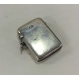 A plain rectangular silver vesta case with hinged