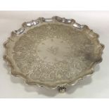 A heavy George III silver salver with engraved dec