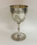 A good Victorian silver goblet engraved with flowe