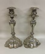 A pair of good quality French cast candlesticks of