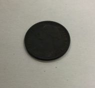 A Victorian Farthing dated 1864.