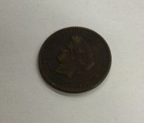 A French 10 Centimes dated 1873.