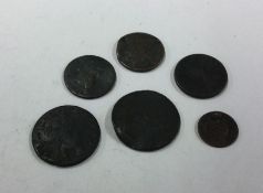 A bag containing 6 x old various coins.