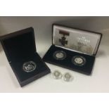 A boxed Proof pair of 2006 silver 50 pence coins t