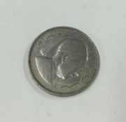 A Libya coin dated 1952.