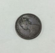 A Queen Victoria 1/2 Anna coin dated 1862.