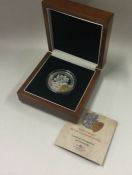 A boxed silver World War I commemorative Crown coi