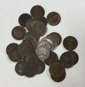 A bank bag of Indian 1/2 Anna coins of various dat