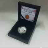 A boxed Guernsey 2015 silver £5 Proof coin.