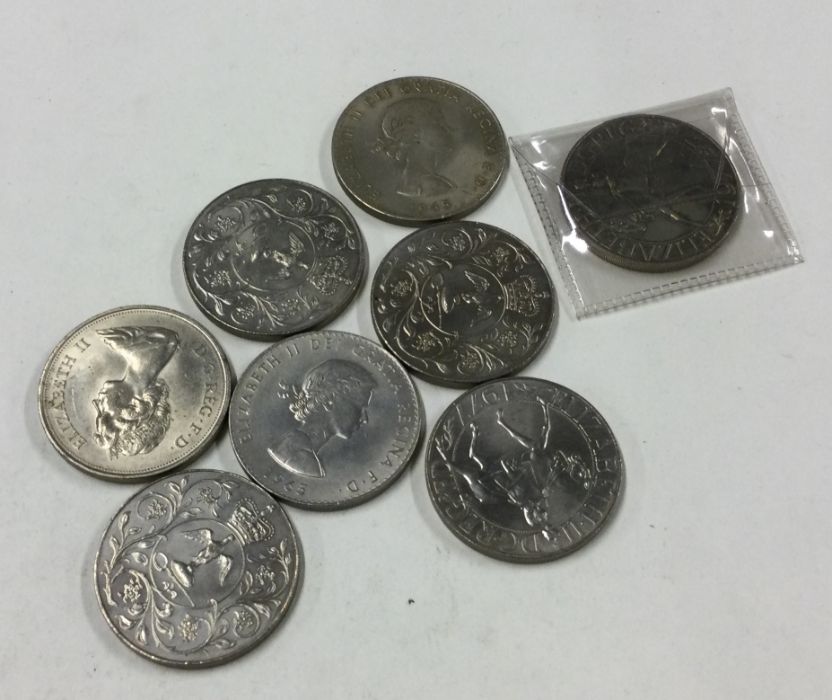 A tin of Crowns (coins).