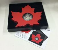 A Royal Canadian Mint 2015 Maple Leaf shaped Proof