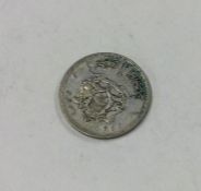 A Morocco silver Dirham (100 Francs) dated 1960.