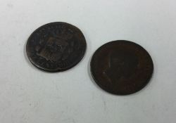 Two old Spanish coins.