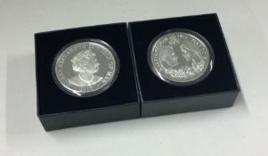 An Isle of Man 1 oz silver Proof coin together wit