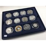 A boxed collection of twelve Proof coins.