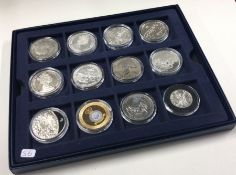 A boxed collection of twelve Proof coins.