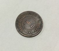 A Straits Settlement coin dated 1874.