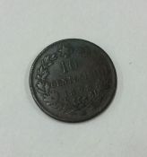 An Italian Umberto I 10 Centesimi coin dated 1893.