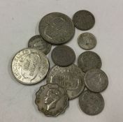 A selection of Seychelles coins; mostly silver.